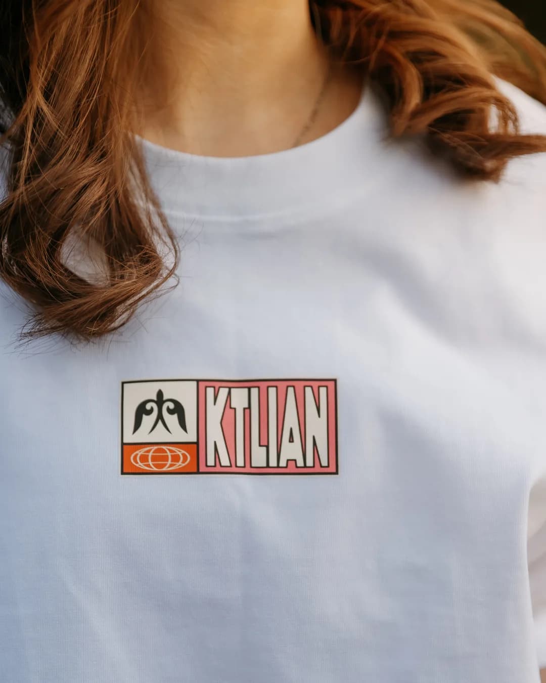 Ktlian oversized T-shirt, pink patch close-up